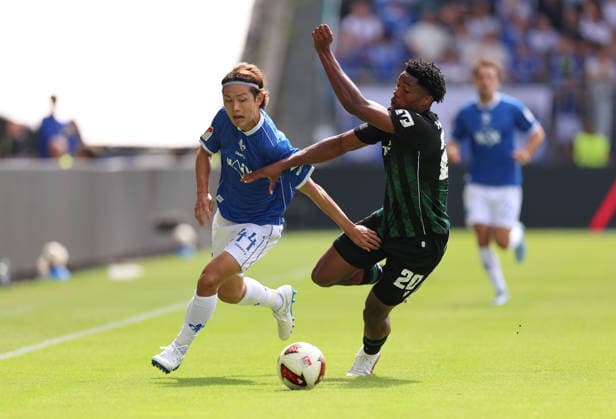 30.08.2026, Fussball 2. Bundesliga, SV Darmstadt 98 - Hannover 96, v.l., Yosuke Furukawa (SV Darmstadt 98), Ime Okon (Hannover 96) DFL DFB REGULATIONS PROHIBIT ANY USE OF PHOTOGRAPHS AS IMAGE SEQUENCES AND OR QUASI-VIDEO. xdcx *** August 30, 2026, Soccer 2. Bundesliga, SV Darmstadt 98 vs. Hannover 96, from left: Yosuke Furukawa (SV Darmstadt 98), Ime Okon (Hannover 96). DFL and DFB regulations prohibit any use of photographs as image sequences and or quasi-video. xdcx Copyright: HMBxMedia Claus