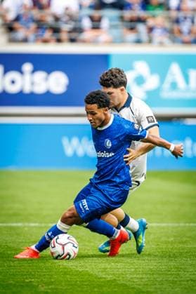 Club s Kyriani Sabbe and Gent s Momodou Lamin Sonko fight for the ball during a soccer match between KAA Gent and Club Brugge, Sunday 30 August 2026 in Gent, on day 4 of the 2026-2027 Jupiler Pro League first division of the Belgian championship. KURTxDESPLENTER  x184736386x