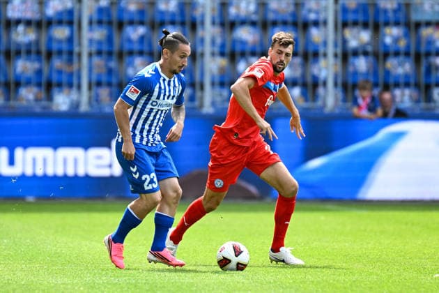 Fußball I Herren I Saison 2026-2027 I 2. Bundesliga I 3. Spieltag I 1. FC Magdeburg - Holstein Kiel I 30.08.2026 Baris Atik (23, 1. FC Magdeburg), Jonas Meffert (28, Holstein Kiel) Magdeburg Avnet Arena (Heinz-Krügel-Platz 1) Sachsen-Anhalt Deutschland *** Soccer I Men s I 2026–2027 Season I 2. Bundesliga I Matchday 3 I 1. FC Magdeburg vs. Holstein Kiel I August 30, 2026 Baris Atik 23, 1 FC Magdeburg, Jonas Meffert 28, Holstein Kiel vs. Magdeburg at Avnet Arena, Heinz Krügel Platz 1, Saxony-Anhalt, Germany Copyright: xLobeca InesxHähnelx