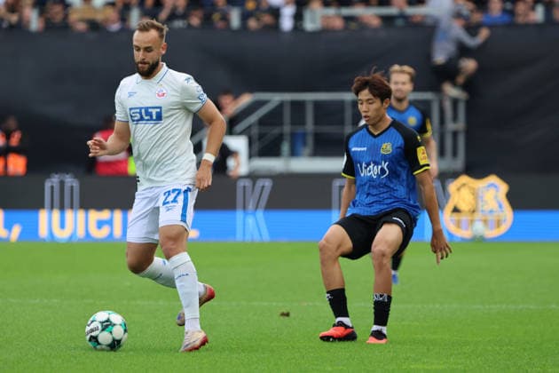 30.08.2026, Fussball, Herren, 3. Liga, Saison 2026 2027, 1. FC Saarbrücken - FC Hansa Rostock, David Kopacz (Hansa Rostock), Seung-Joon Lee (1. FC Saarbrücken) Saarbrücken Ludwigsparkstadion Saarland Deutschland (DEU) Copyright: xSebastianxBachx