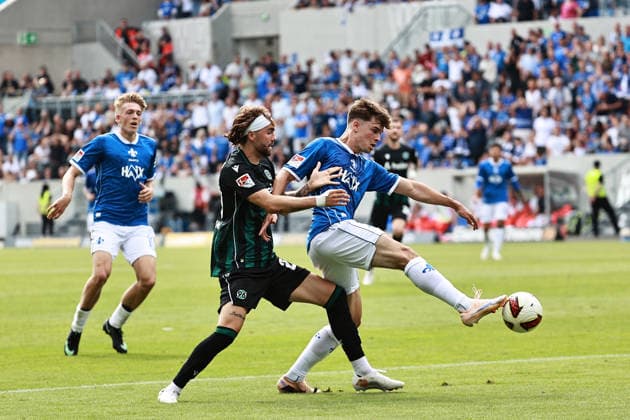 30.08.2026, xtvx, Fussball 2.Bundesliga, SV Darmstadt 98 - Hannover 96 v.l. Zweikampf, Duell, duel, tackle, compete Kolja Oudenne (Hannover 96) Noah Weisshaupt (SV Darmstadt 98) (DFL DFB REGULATIONS PROHIBIT ANY USE OF PHOTOGRAPHS as IMAGE SEQUENCES and or QUASI-VIDEO) Darmstadt *** August 30, 2026, xtvx, Soccer, 2. Bundesliga, SV Darmstadt 98 vs. Hannover 96, tackle, duel, tackle, compete: Kolja Oudenne (Hannover 96) vs. Noah Weisshaupt (SV Darmstadt 98). DFL and DFB regulations prohibit any use of photographs as image sequences and or quasi-video. Darmstadt