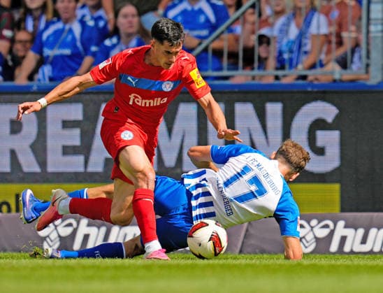 Guillermo Balzi (Holstein Kiel, 8) im Zweikampf mit Alexander Nollenberger (1. FC Magdeburg, 17) GER, 1. FC Magdeburg vs Holstein Kiel, 2. Bundesliga, 3. Spieltag, Saison 2026-27, Avnet Arena, Magdeburg, 30.08.2026 DFL REGULATIONS PROHIBIT ANY USE OF PHOTOGRAPHS AS IMAGE SEQUENCES AND OR QUASI-VIDEO GER, 1. FC Magdeburg vs Holstein Kiel, 2. Bundesliga, 3. Spieltag, Saison 2026-27, 30.08.2026 Magdeburg *** Guillermo Balzi (Holstein Kiel, 8) in a tackle with Alexander Nollenberger (1 FC Magdeburg, 17) GER, 1 FC Magdeburg vs. Holstein Kiel, 2. Bundesliga, Matchday 3, 2026–27 season, Avnet Arena, Magdeburg, August 30, 2026 DFL regulations prohibit any use of photographs as image sequences and or quasi-video GER, 1 FC Magdeburg vs. Holstein Kiel, 2. Bundesliga, Matchday 3, 2026–27 season, August 30, 2026, Magdeburg Copyright: xEibner-Pressefoto ScottxColemanx EP_SCN