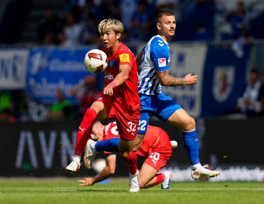 Hiroki Sekine (Holstein Kiel, 32), Adrian Kapralik (Holstein Kiel, 20), und Mateusz Zukowski (1. FC Magdeburg, 22) GER, 1. FC Magdeburg vs Holstein Kiel, 2. Bundesliga, 3. Spieltag, Saison 2026-27, Avnet Arena, Magdeburg, 30.08.2026 DFL REGULATIONS PROHIBIT ANY USE OF PHOTOGRAPHS AS IMAGE SEQUENCES AND OR QUASI-VIDEO GER, 1. FC Magdeburg vs Holstein Kiel, 2. Bundesliga, 3. Spieltag, Saison 2026-27, 30.08.2026 Magdeburg *** Hiroki Sekine, Holstein Kiel, 32; Adrian Kapralik, Holstein Kiel, 20; and Mateusz Zukowski, 1 FC Magdeburg, 22 (GER); 1 FC Magdeburg vs. Holstein Kiel, 2. Bundesliga, Matchday 3, 2026–27 season, Avnet Arena, Magdeburg, August 30, 2026 DFL regulations prohibit any use of photographs as image sequences and or quasi-video GER, 1 FC Magdeburg vs. Holstein Kiel, 2. Bundesliga, Matchday 3, 2026–27 Season, August 30, 2026, Magdeburg Copyright: xEibner-Pressefoto ScottxColemanx EP_SCN