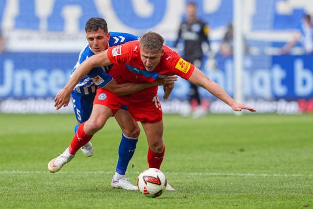 30.08.2026, xydrx, Fußball, 2. Fußball Bundesliga, 1.FC Magdeburg - Holstein Kiel, Saison 2026 2027, Avnet Arena: Tobias Mueller (1.FC Magdeburg, 5) im Zweikampf gegen Phil Harres (Holstein Kiel, 19) DFB regulations prohibit any use of photographs as image sequences and or quasi-video. *** August 30, 2026, xydrx, Soccer, 2. Bundesliga, 1. FC Magdeburg vs. Holstein Kiel, 2026–2027 season, Avnet Arena: Tobias Mueller of 1. FC Magdeburg, No. 5 in a tackle against Phil Harres of Holstein Kiel, 19. DFB regulations prohibit any use of photographs as image sequences and or quasi-video Copyright: HMBxMedia YannisxDreimann
