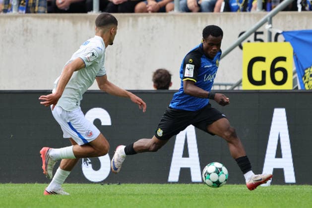 30.08.2026, Fussball, Herren, 3. Liga, Saison 2026 2027, 1. FC Saarbrücken - FC Hansa Rostock, Abdenego Nankishi (1. FC Saarbrücken), Ouassim Karada (Hansa Rostock) Saarbrücken Ludwigsparkstadion Saarland Deutschland (DEU) Copyright: xSebastianxBachx