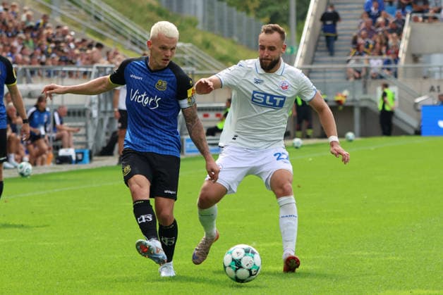 30.08.2026, Fussball, Herren, 3. Liga, Saison 2026 2027, 1. FC Saarbrücken - FC Hansa Rostock, Florian Pick (1. FC Saarbrücken), David Kopacz (Hansa Rostock) Saarbrücken Ludwigsparkstadion Saarland Deutschland (DEU) Copyright: xSebastianxBachx