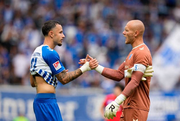 Falko Michel (1. FC Magdeburg, 21) und Dominik Reimann (1. FC Magdeburg, 1) feiern nach dem Spiel. GER, 1. FC Magdeburg vs Holstein Kiel, 2. Bundesliga, 3. Spieltag, Saison 2026-27, Avnet Arena, Magdeburg, 30.08.2026 DFL REGULATIONS PROHIBIT ANY USE OF PHOTOGRAPHS AS IMAGE SEQUENCES AND OR QUASI-VIDEO GER, 1. FC Magdeburg vs Holstein Kiel, 2. Bundesliga, 3. Spieltag, Saison 2026-27, 30.08.2026 Magdeburg *** Falko Michel (1 FC Magdeburg, 21) and Dominik Reimann (1 FC Magdeburg, 1) celebrate after the game: GER, 1 FC Magdeburg vs. Holstein Kiel, 2. Bundesliga, Matchday 3, 2026–27 season, Avnet Arena, Magdeburg, August 30, 2026. DFL regulations prohibit any use of photographs as image sequences and or quasi-video. GER, 1 FC Magdeburg vs. Holstein Kiel, 2. Bundesliga, Matchday 3, 2026–27 season, August 30, 2026, Magdeburg Copyright: xEibner-Pressefoto ScottxColemanx EP_SCN
