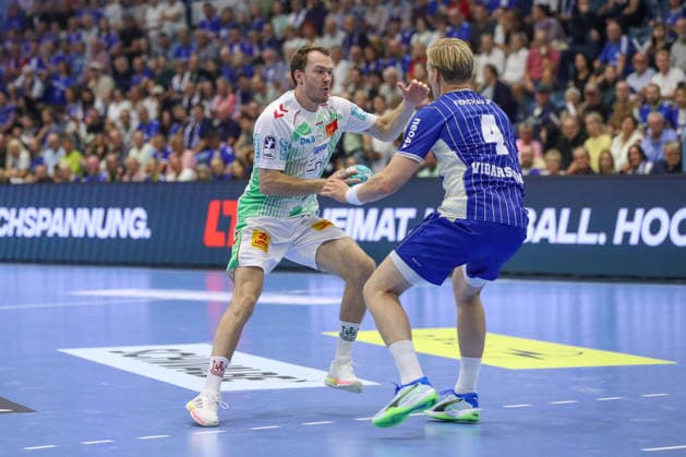 30.08.2026, xgox, Handball - Opel HBL VfL Gummersbach - SC Magdeburg emspor, v.l. Felix Claar (Magdeburg, 7), Ellidi Snaer Vidarsson (Gummersbach, 4) Zweikampf, Duell, Kampf, tackle Gummersbach
