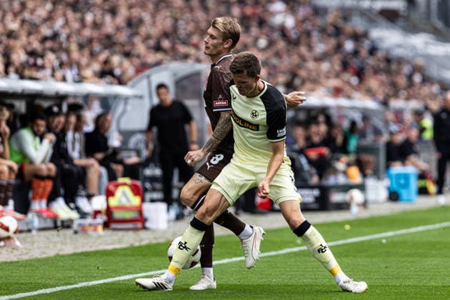 2. Fußball Bundesliga: FC St. Pauli - 1. FC Kaiserslautern; 30.08.2026 Eric Smith (FC St. Pauli, 8), Fabian Kunze (1. FC Kaiserslautern, 6) 2. Fußball Bundesliga 3.Spieltag: FC St. Pauli - 1. FC Kaiserslautern; Millerntor-Stadion, Hamburg, St. Pauli; 30.08.2026 DFL regulations prohibit any use of photographs as image sequences and or quasi video. *** 2 Bundesliga FC St. Pauli 1 FC Kaiserslautern August 30, 2026 Eric Smith FC St. Pauli, 8, Fabian Kunze 1 FC Kaiserslautern, 6 2 German Bundesliga Matchday 3 FC St. Pauli 1 FC Kaiserslautern Millerntor Stadium, Hamburg, St. Pauli August 30, 2026 DFL regulations prohibit any use of photographs as image sequences and or quasi-video Copyright: xBEAUTIFULxSPORTS Buriakovx