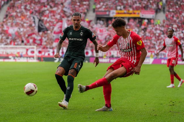 1. Bundesliga: SC Freiburg vs SV Werder Bremen, 30.08.2026 Zweikampf zwischen Justin Njinmah (SV Werder Bremen, 11) und Derry Scherhant (SC Freiburg, 7) 1. Bundesliga: SC Freiburg vs SV Werder Bremen, Europa-Park-Stadion, 30.08.2026 DFB DFL REGULATIONS PROHIBIT ANY USE OF PHOTOGRAPHS AS IMAGE SEQUENCES AND OR QUASI-VIDEO. *** 1 Bundesliga: SC Freiburg vs. SV Werder Bremen, August 30, 2026—A tackle between Justin Njinmah (SV Werder Bremen, No. 11) and Derry Scherhant (SC Freiburg, No. 7). 1 Bundesliga: SC Freiburg vs. SV Werder Bremen, Europa-Park Stadium, August 30, 2026 DFB and DFL regulations prohibit any use of photographs as image sequences and or quasi-video. Copyright: xBEAUTIFULxSPORTS Boscox