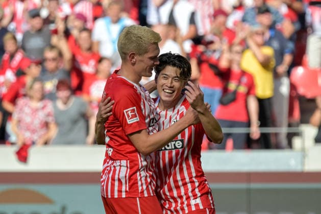 Jubel zum Tor zum 4:0 durch Yuito Suzuki (SC Freiburg, 14) mit Matthias Ginter (SC Freiburg, 28) GER, SC Freiburg vs Werder Bremen, Fussball, Bundesliga, 1. Spieltag, Saison 2026 2027, 30.08.2026 DFL DFB REGULATIONS PROHIBIT ANY USE OF PHOTOGRAPHS AS IMAGE SEQUENCES AND OR QUASI-VIDEO GER, SC Freiburg vs Werder Bremen, Fussball, Bundesliga, 1. Spieltag, Saison 2026 2027, 30.08.2026 Freiburg *** Celebration after Yuito Suzuki s goal to make it 4–0 for SC Freiburg, No. 14 Matthias Ginter of SC Freiburg, No. 28 GER, SC Freiburg vs. Werder Bremen, Soccer, Bundesliga, Matchday 1, 2026–2027 Season, August 30, 2026 DFL and DFB regulations prohibit any use of photographs as image sequences and or quasi-video GER, SC Freiburg vs. Werder Bremen, soccer, Bundesliga, Matchday 1, 2026–2027 Season, August 30, 2026, Freiburg Copyright: xEibner-Pressefotox EP_THS