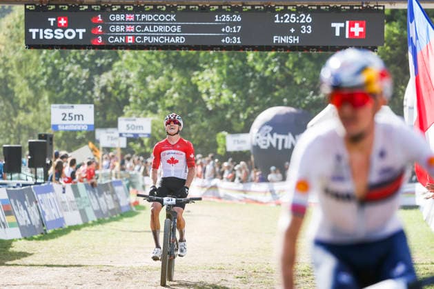 TRENTO, ITALY - AUGUST 30: Cole Punchard from Canada finished in third position an win the bronze medal during the Uci Mountainbike World Championship, WM, Weltmeisterschaft - Men Elite Cross-County World Championships at Val di Sole on August 30, 2026 in Trento, Italy. Trento Val di Sole Trento Italy Copyright: xJustPictures.ch FrancescoxMinghettix jp-en-EuSpIm-JP6_FRM_UCIWC_ManXCO_30Aug_000347