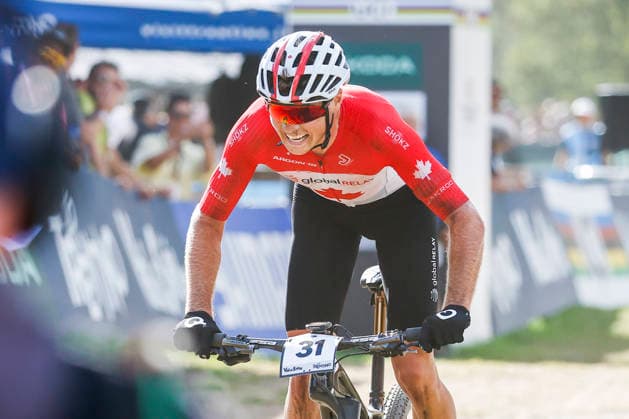 TRENTO, ITALY - AUGUST 30: Cole Punchard from Canada finished in third position an win the bronze medal during the Uci Mountainbike World Championship, WM, Weltmeisterschaft - Men Elite Cross-County World Championships at Val di Sole on August 30, 2026 in Trento, Italy. Trento Val di Sole Trento Italy Copyright: xJustPictures.ch FrancescoxMinghettix jp-en-EuSpIm-JP6_FRM_UCIWC_ManXCO_30Aug_000348