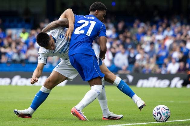 Jorrel Hato of Chelsea and Diego Gomez of Brighton and Hove Albion Chelsea v Brighton and Hove Albion, Premier League Football, Football, Stamford Bridge, London, UK - 30 Aug 2026London Stamford Bridge United Kingdom EDITORIAL USE ONLY No use with unauthorised audio, video, data, fixture lists, club league logos or live services. Online in-match use limited to 120 images, no video emulation. No use in betting, games or single club league player publications. Copyright: xIanxTuttle Shutterstockx 17119079bu