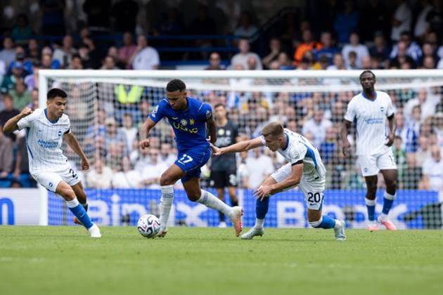 Morgan Rogers of Chelsea between Costinha of Brighton and Hove Albion and Olivier Boscagli of Brighton and Hove Albion Chelsea v Brighton and Hove Albion, Premier League Football, Football, Stamford Bridge, London, UK - 30 Aug 2026London Stamford Bridge United Kingdom EDITORIAL USE ONLY No use with unauthorised audio, video, data, fixture lists, club league logos or live services. Online in-match use limited to 120 images, no video emulation. No use in betting, games or single club league player publications. Copyright: xIanxTuttle Shutterstockx 17119079cd