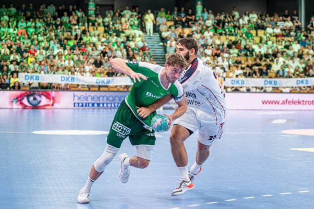 OPEL Handball Bundesliga; HSG Wetzlar - SG BBM Bietigheim, 30.08.26 Niklas Theiß (HSG Wetzlar, 9), Marcus Norrbrink (SG BBM Bietigheim, 23) OPEL Handball Bundesliga; HSG Wetzlar - SG BBM Bietigheim: Wetzlar, 30.08.26 Copyright: xBEAUTIFULxSPORTS Roeczeyx