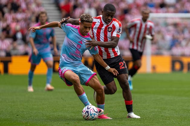 30th August 2026; Stadium of Light, Sunderland, England; Premier League Football, Sunderland versus Fulham; Josh King of Fulham FC dribbling past Noah Sadiki of Sunderland AFC PeterxNorth