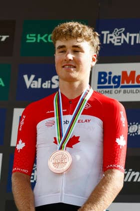 TRENTO, ITALY - AUGUST 30: Cole Punchard from Canada wearing his bronze medal during the Uci Mountainbike World Championship, WM, Weltmeisterschaft - Men Elite Cross-County World Championships at Val di Sole on August 30, 2026 in Trento, Italy. Trento Val di Sole Trento Italy Copyright: xJustPictures.ch FrancescoxMinghettix jp-en-EuSpIm-JP6_FRM_UCIWC_ManXCO_30Aug_000358
