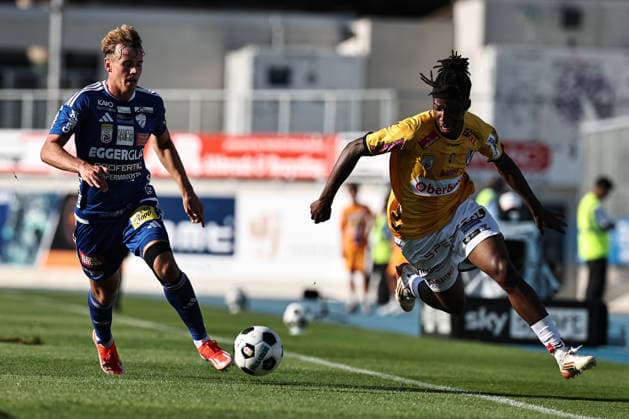 SOCCER - BL, Hartberg vs Ried HARTBERG,AUSTRIA,30.AUG.26 - SOCCER - ADMIRAL Bundesliga, TSV Hartberg vs SV Ried. Image shows Fabian Wilfinger (Hartberg) and Evan Eghosa Aisowieren (Ried).  GEPAxpictures xChrisxBauer