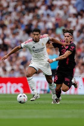 RECORD DATE NOT STATED Jude Bellingham (Real Madrid CF) and Angel Recio (Malaga CF) battle for the ball during the LaLiga EA Sports match between Real Madrid CF and Malaga CF at Estadio Santiago BernabÃ u on August 30, 2026 in Madrid, Spain. (Photo by Manu Reino DeFodi Images) -