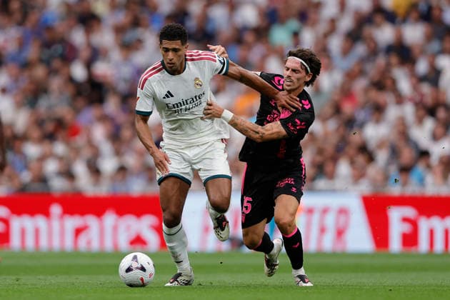 RECORD DATE NOT STATED Jude Bellingham (Real Madrid CF) and Angel Recio (Malaga CF) battle for the ball during the LaLiga EA Sports match between Real Madrid CF and Malaga CF at Estadio Santiago BernabÃ u on August 30, 2026 in Madrid, Spain. (Photo by Manu Reino DeFodi Images) -