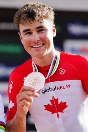 2026 UCI Mountain Bike World Championships Picture by Alex Whitehead SWpix.com - 30 08 2026 - Cycling - 2026 UCI Mountain Bike World Championships - Val di Sole, Trentino, Italy - Cross-country Olympic (XCO) - Men Elite Podium - Cole Punchard (Canada) receiving the Bronze Medal Copyright: x xSWpix.comx(t axPhotographyxHubxLtd)xAlexxWhitehead SWpix.comx SWP-3030-21661