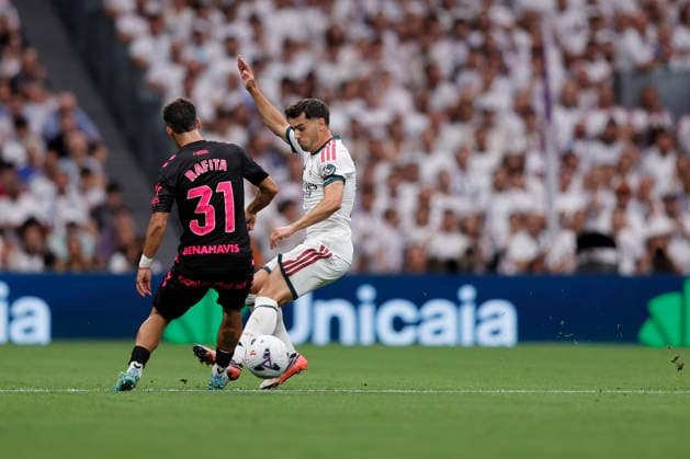 RECORD DATE NOT STATED Brahim Diaz (Real Madrid CF) and Rafita Garrido (Malaga CF) battle for the ball during the LaLiga EA Sports match between Real Madrid CF and Malaga CF at Estadio Santiago BernabÃ u on August 30, 2026 in Madrid, Spain. (Photo by Manu Reino DeFodi Images) -