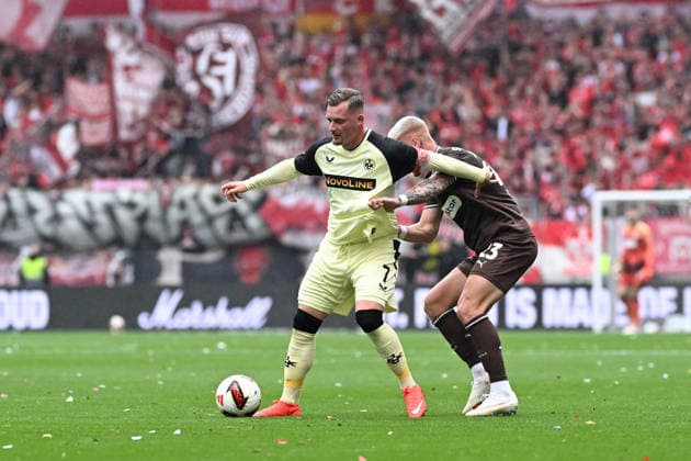 2. Bundesliga - FC St. Pauli - 1. FC Kaiserslautern am 30.08.2026 im Millerntor-Stadion in Hamburg Marlon Ritter (Kaiserslautern) im Zweikampf gegen Louis Oppie (St. Pauli) *** 2. Bundesliga: FC St. Pauli 1, FC Kaiserslautern on August 30, 2026, at Millerntor Stadium in Hamburg. Marlon Ritter of Kaiserslautern in a duel with Louis Oppie of St. Pauli. MT