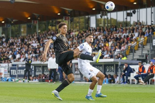 VELSEN, 30-08-2026 , BUKO Stadium , season 2026 2027 , Dutch Eredivisie football , match between Telstar and Ajax , picture shows Ajax player Aaron Bouwman and Telstar player Emirhan Demircan Telstar - Ajax  x206253307x Copyright: