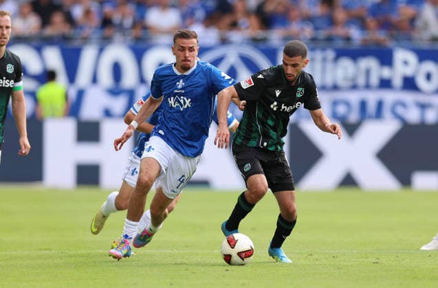 30.08.2026, Fussball 2. Bundesliga, SV Darmstadt 98 - Hannover 96, v.l., Lance Duijvestijn (SV Darmstadt 98), Waniss Taibi (Hannover 96) DFL DFB REGULATIONS PROHIBIT ANY USE OF PHOTOGRAPHS AS IMAGE SEQUENCES AND OR QUASI-VIDEO. xdcx *** August 30, 2026, Soccer, 2. Bundesliga, SV Darmstadt 98 vs. Hannover 96, from left: Lance Duijvestijn (SV Darmstadt 98), Waniss Taibi (Hannover 96). DFL and DFB regulations prohibit any use of photographs as image sequences and or quasi-video. xdcx Copyright: HMBxMedia Claus
