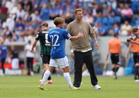 30.08.2026, Fussball 2. Bundesliga, SV Darmstadt 98 - Hannover 96, v.l., Lars Kehl (SV Darmstadt 98), Trainer Florian Kohfeldt (SV Darmstadt 98) DFL DFB REGULATIONS PROHIBIT ANY USE OF PHOTOGRAPHS AS IMAGE SEQUENCES AND OR QUASI-VIDEO. xdcx *** August 30, 2026, Soccer, 2. Bundesliga, SV Darmstadt 98 vs. Hannover 96, from left: Lars Kehl (SV Darmstadt 98), Coach Florian Kohfeldt (SV Darmstadt 98). DFL and DFB regulations prohibit any use of photographs as image sequences and or quasi-video. xdcx Copyright: HMBxMedia Claus