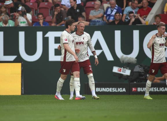 Fussball, Herren, Saison 2026 2027, FC Augsburg - FC Schalke 04, Bundesliga, WWK Arena 1:0 durch Michael Gregoritsch (FC Augsburg) Tor, hier mit Marius Wolf (FC Augsburg) (re.) DFL DFB regulations prohibit any use of photographs as image sequences and or quasi-video *** Soccer, Men s, 2026–2027 Season, FC Augsburg vs. FC Schalke 04, Bundesliga, WWK Arena; 1–0 goal by Michael Gregoritsch (FC Augsburg), pictured here with Marius Wolf (FC Augsburg); DFL and DFB regulations prohibit any use of photographs as image sequences and or quasi-video