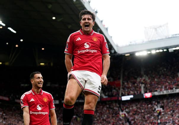 Manchester, England, 30th August 2026. Harry Maguire of Manchester United, ManU celebrates after his deflected shot went in for their second goal during the Manchester United vs Ipswich Town Premier League match at Old Trafford, Manchester. Picture credit should read: Andrew Yates Sportimage EDITORIAL USE ONLY. No use with unauthorised audio, video, data, fixture lists, club league logos or live services. Online in-match use limited to 120 images, no video emulation. No use in betting, games or single club league player publications. SPI_060_AY_Man_Utd_Ipswich SPI-4945-0060