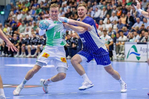 30.08.2026, xsefx, Handball, 1. HBL, VfL Gummersbach - SC Magdeburg, Saison 2026 2027 Herren, Schwalbe-Arena: Gisli Thorgeir Kristjansson (SC Magdeburg 10) im Zweikampf gegen Kristjan Horzen (VfL Gummersbach 27) Nordrhein-Westfalen Deutschland