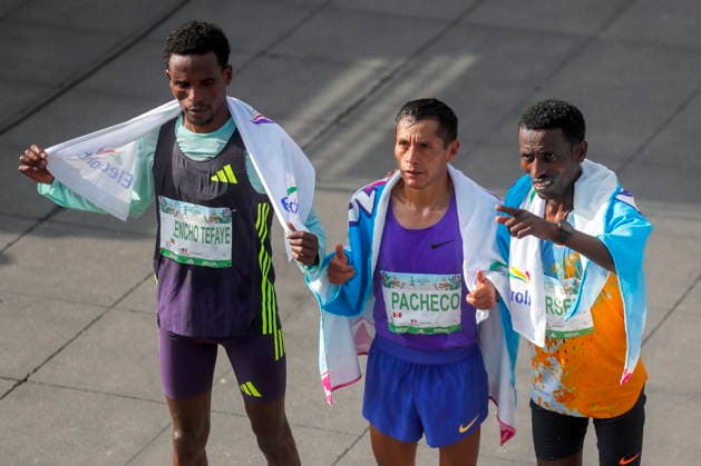 43rd edition of the Mexico City Marathon Peruvian Cristhian Pacheco Mendoza (C), who finished first, and Ethiopians Anbesa Tesfaye Lencho (L), who finished second, and Balew Yihunie Derseh (R), who finished third, pose after crossing the finish line at the 43rd edition of the Mexico City Marathon 2026 in Mexico City, Mexico, 30 August 2026. Ciudad de México (es-ES) Mexico  Copyright: xISAACxESQUIVELx
