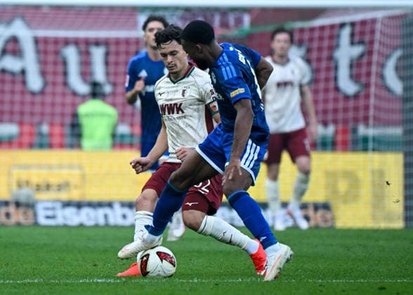 30.08.2026, xemx, Fussball 1.Bundesliga, FC Augsburg - FC Schalke 04 v.l. Fabian Rieder (FC Augsburg), Moussa Sylla (FC Schalke 04) Zweikampf, Aktion, action, battle for the ball (DFL DFB REGULATIONS PROHIBIT ANY USE OF PHOTOGRAPHS as IMAGE SEQUENCES and or QUASI-VIDEO) Augsburg *** August 30, 2026, xemx, Soccer, Bundesliga 1, FC Augsburg vs. FC Schalke 04, Fabian Rieder, FC Augsburg, Moussa Sylla, FC Schalke 04, tackle, action, battle for the ball. DFL and DFB regulations prohibit any use of photographs as image sequences and or quasi-video. Augsburg