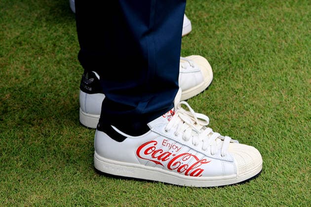 ATLANTA, GA - AUGUST 30: A detailed view of the custom adidas shoes worn by John Murphy, President and CFO of the Coca-Cola Company during the fourth and final round of the PGA, Golf Herren Tour Championship on August 30, 2026 at East Lake Golf Club in Atlanta, Georgia. (Photo by David J. Griffin Icon Sportswire) GOLF: AUG 30 PGA Tour Championship EDITORIAL USE ONLY Icon9532608300129