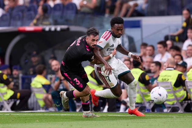 ESP: LaLiga EA Sports Real Madrid v Malaga CF Carlos Puga of Malaga blocks to Vinicius Junior of Real Madrid during LaLiga EA Sports match between Real Madrid v Malaga CF played at Bernabeu Stadium, Madrid on August 30 2026 in Spain Madrid Spain Soccer Copyright: xAgenciaxLOFx
