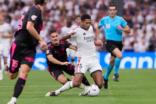 ESP: LaLiga EA Sports Real Madrid v Malaga CF Carlos Ruiz Chupete of Malaga and Jude Bellingham of Real Madrid during LaLiga EA Sports match between Real Madrid v Malaga CF played at Bernabeu Stadium, Madrid on August 30 2026 in Spain Madrid Spain Soccer Copyright: xAgenciaxLOFx
