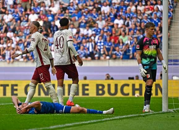 30.08.2026, Fussball Bundesliga 2026 2027, 1.Spieltag, FC Augsburg - FC Schalke 04, in der WWK-Arena Augsburg, Robin Gosens (FC Schalke 04) am Boden. ***DFL and DFB regulations prohibit any use of photographs as image sequences and or quasi-video.*** *** August 30, 2026, 2026–2027 Bundesliga Season, Matchday 1, FC Augsburg vs. FC Schalke 04, at the WWK Arena in Augsburg, Robin Gosens of FC Schalke 04 on the ground ***DFL and DFB regulations prohibit any use of photographs as image sequences and or quasi-video***