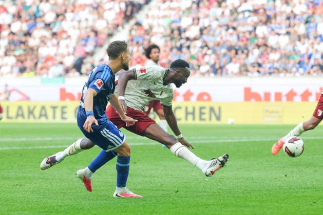 Adil Aouchiche (FC Schalke 04, 24) mit Chrislain Matsima (FC Augsburg, 05), GER, FC Augsburg vs. FC Schalke 04, Fussball, Bundesliga, 1. Spieltag, Saison 2026 2027, 30.08.2026, DFL DFB REGULATIONS PROHIBIT ANY USE OF PHOTOGRAPHS as IMAGE SEQUENCES and or QUASI-VIDEO, GER, FC Augsburg vs. FC Schalke 04, Fussball, Bundesliga, 1. Spieltag, Saison 2026 2027, 30.08.2026 Augsburg *** Adil Aouchiche (FC Schalke 04), 24, with Chrislain Matsima (FC Augsburg), 05, GER, FC Augsburg vs. FC Schalke 04, Soccer, Bundesliga, Matchday 1, 2026–2027 Season, August 30, 2026, DFL and DFB regulations prohibit any use of photographs as image sequences and or quasi-video, GER, FC Augsburg vs. FC Schalke 04, soccer, Bundesliga, Matchday 1, 2026–2027 Season, August 30, 2026, Augsburg Copyright: xEibner-Pressefoto JennixMaulx EP_JML
