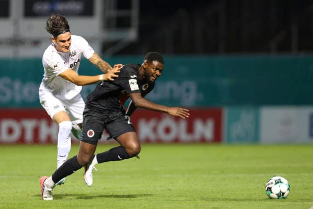 Antonio Tikvic (SC Preussen Muenster) und Verthomy Schilo Boboy (FC Viktoria Koeln) im Zweikampf waehrend des Spiels der 3. Liga zwischen Viktoria Koeln und Preussen Muenster, Sportpark Hoehenberg am 30. August 2026 in Koeln, Deutschland. (Foto von Oliver Kaelke DeFodi Images) +++ Antonio Tikvic (SC Preussen Muenster) und Verthomy Schilo Boboy (FC Viktoria Koeln) battle for the ball during the 3. Liga match between Viktoria Koeln and Preussen Muenster at Sportpark Hoehenberg on August 30, 2026 in Cologne, Germany. (Photo by Oliver Kaelke DeFodi Images) DFB DFL REGULATIONS PROHIBIT ANY USE OF PHOTOGRAPHS AS IMAGE SEQUENCES AND OR QUASI-VIDEO. (Photo by Oliver Kaelke DeFodi Images) -