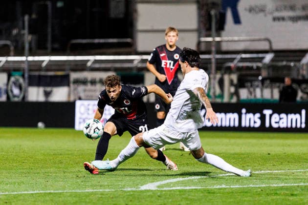 KOELN, GERMANY - AUGUST 30, 2026: Lucas Wolf (FC Viktoria Köln, 21) and Antonio Tikvic (Preußen Münster, 4) during the 3rd division match on gameday 3 between Viktoria Koeln vs. Preußen Muenster at the Sportpark Hoehenberg on August 30, 2026 in Koeln, Germany. DFL REGULATIONS PROHIBIT ANY USE OF PHOTOGRAPHS AS IMAGE SEQUENCES AND OR QUASI-VIDEO. Nordrhein-Westfalen Germany Copyright: xLeahxKohringx