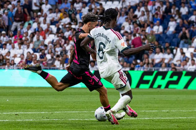 ESP: Real Madrid CF v Malaga CF - La Liga EA Sports David Larrubia of Malaga is defended by Eduardo Camavinga of Real Madrid during La Liga EA Sports match between Real Madrid and Malaga CF at Estadio Santiago Bernabeu on August 30, 2026 in Madrid, Spain. Madrid Madrid Spain Football Copyright: xAlejandroxMatiasx
