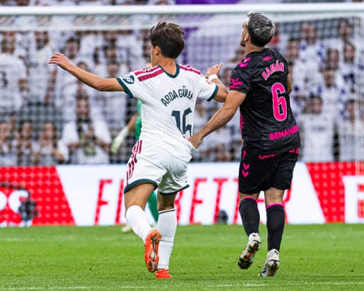 ESP: Real Madrid CF v Malaga CF - La Liga EA Sports Arda Guler of Real Madrid is defended by Ramon Enriquez during La Liga EA Sports match between Real Madrid and Malaga CF at Estadio Santiago Bernabeu on August 30, 2026 in Madrid, Spain. Madrid Madrid Spain Football Copyright: xAlejandroxMatiasx
