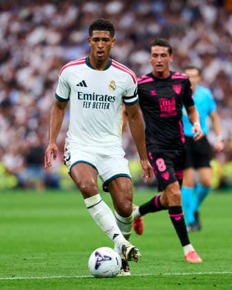 SOCCER- La Liga EA match between Real Madrid CF and Malaga CF at Santiago Bernabeu Stadium, on August 30, 2026. Jude Bellingham of Real Madrid CF battles for the ball with Carlos Dotor of Malaga CF during the La Liga EA Sport match between Real Madrid CF and Malaga CF at Santiago Bernabeu Stadium, on August 30, 2026. Madrid Madrid Spain EDITORIAL USE ONLY Copyright: xx SENIS-CEBOLLAx xALFAQUIx dpphotos202041