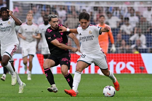 August 30, 2026, Madrid, Madrid, Spain: 15 ARDA GULER of Real Madrid CF being fouled during the match on Matchday 3 of the 2026-27 National League First Division Championship between REAL MADRID C.F. and MALAGA CF, played at the Bernabeu Stadium on August 30, 2026, in Madrid, Spain. Madrid Spain - ZUMAc312 20260830_zsp_c312_261 Copyright: xOscarxManuelxSanchezx