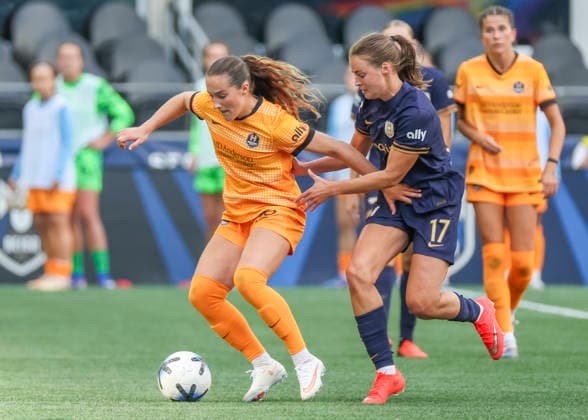 SEATTLE, WA - AUGUST 30: (left to right) Houston Dash midfielder Linda Ullmark (30) keeps the ball away from Seattle Reign FC midfielder Sally Menti (17) in the second half during the NWSL match between the Houston Dash and Seattle Reign FC on August 30, 2026 at Lumen Field in Seattle, Washington. (Photo by Leslie Plaza Johnson Icon Sportswire) SOCCER: AUG 30 NWSL Seattle Reign FC vs Houston Dash EDITORIAL USE ONLY Icon260830032