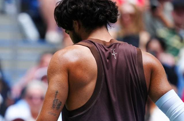 Carlos Alcaraz with a tattoo marking his first US Open win in 2022 2026 US Open, Day Two, USTA Billie Jean King National Tennis Center, New York, USA - 31 Aug 2026New York USTA Billie Jean King National T New York (NY) United States of America EDITORIAL USE ONLY No use with unauthorised audio, video, data, fixture lists, club league logos or live services. Online in-match use limited to 120 images, no video emulation. No use in betting, games or single club league player publications. Copyright: xJavierxGarcia Shutterstockx 17124548w