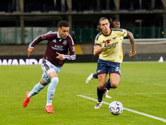 Birmingham, England, 31st August 2026. Alysson Edward of Aston Villa (l) and Riccardo Calafiori of Arsenal during the Aston Villa vs Arsenal Premier League match at Villa Park, Birmingham. Picture credit should read: Andrew Yates Sportimage EDITORIAL USE ONLY. No use with unauthorised audio, video, data, fixture lists, club league logos or live services. Online in-match use limited to 120 images, no video emulation. No use in betting, games or single club league player publications. SPI_052_AY_Villa_Arsenal SPI-4946-0052